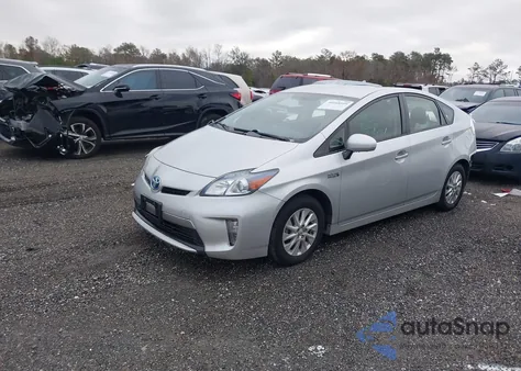 2014 Toyota Prius Plug-In z USA, uszkodzony, nr VIN JTDKN3DP3E3059052